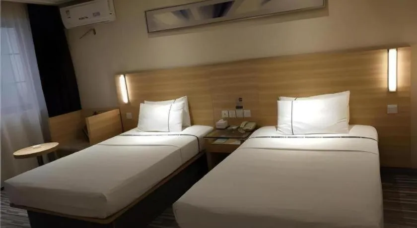 Bed in City Comfort Inn Wuhan Wangjiawan Yulong Road Metro Station