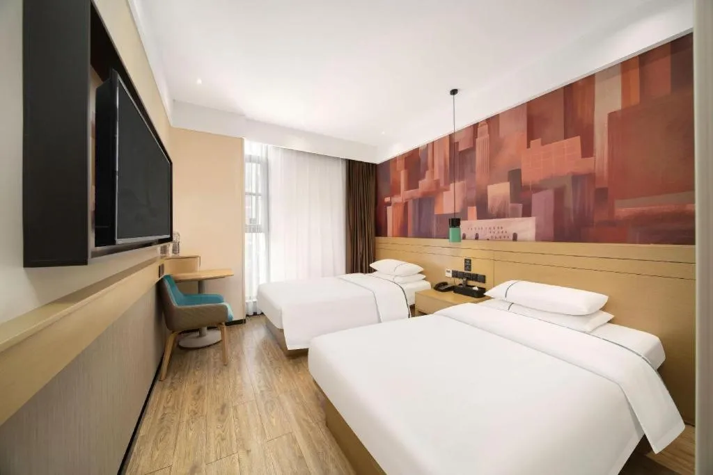 Bed in City Comfort Inn Wuhan Yuanlin Road Metro Station