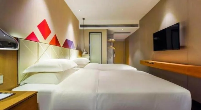 Bed in Borrman Hotel Guangzhou Quzhuang Metro Station