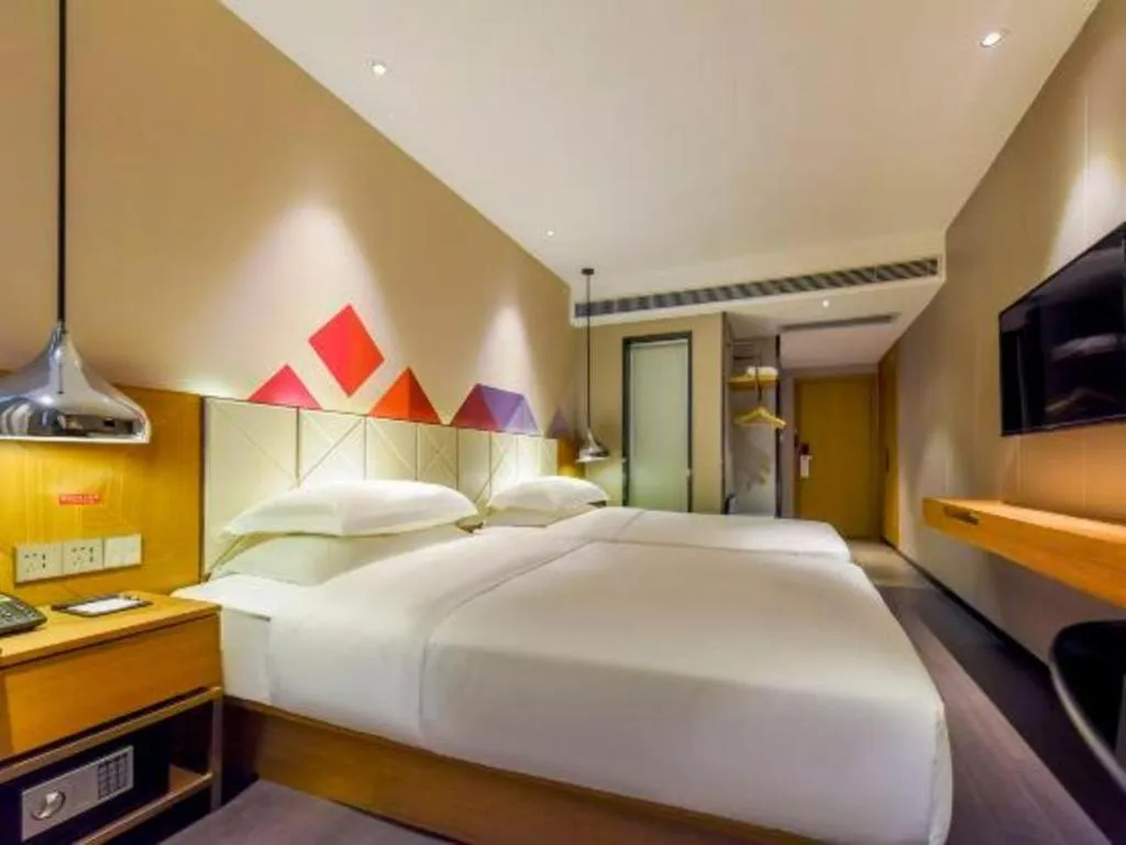 Bed in Borrman Hotel Guangzhou Quzhuang Metro Station