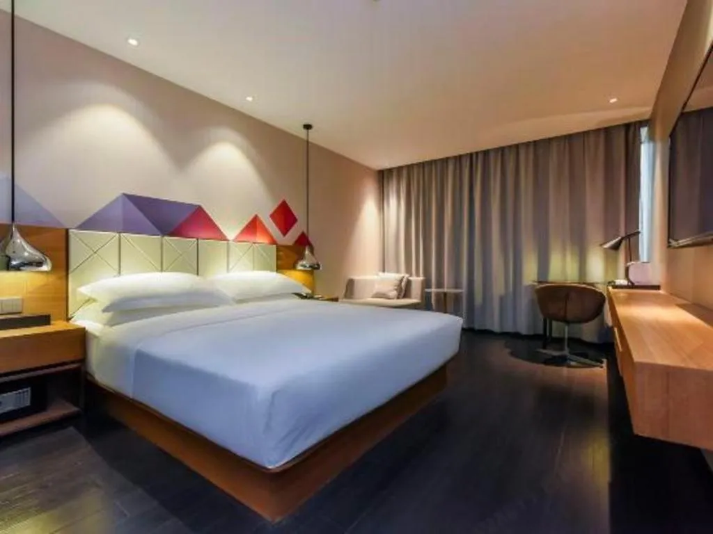 Bed in Borrman Hotel Guangzhou Quzhuang Metro Station