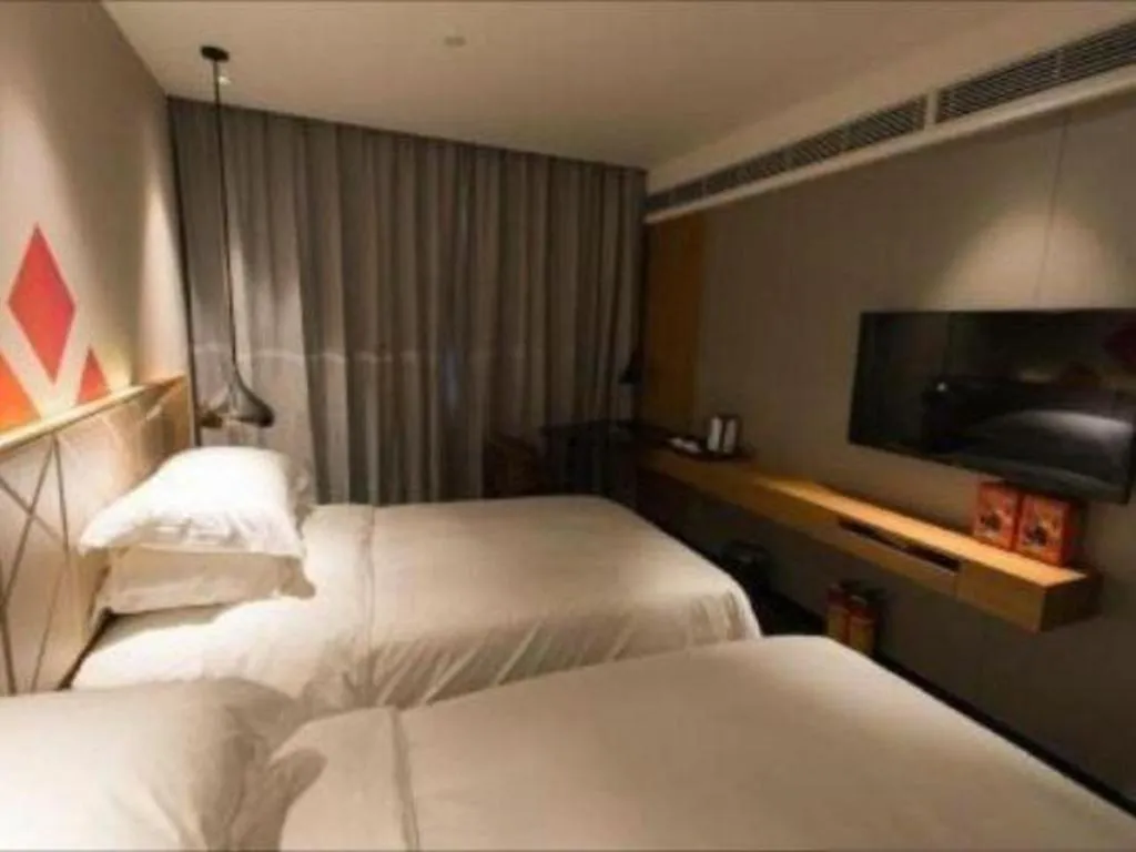 Bed in Borrman Hotel Guangzhou Quzhuang Metro Station