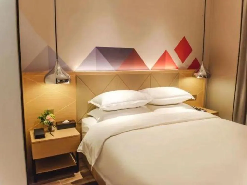 Bed in Borrman Hotel Guangzhou Quzhuang Metro Station