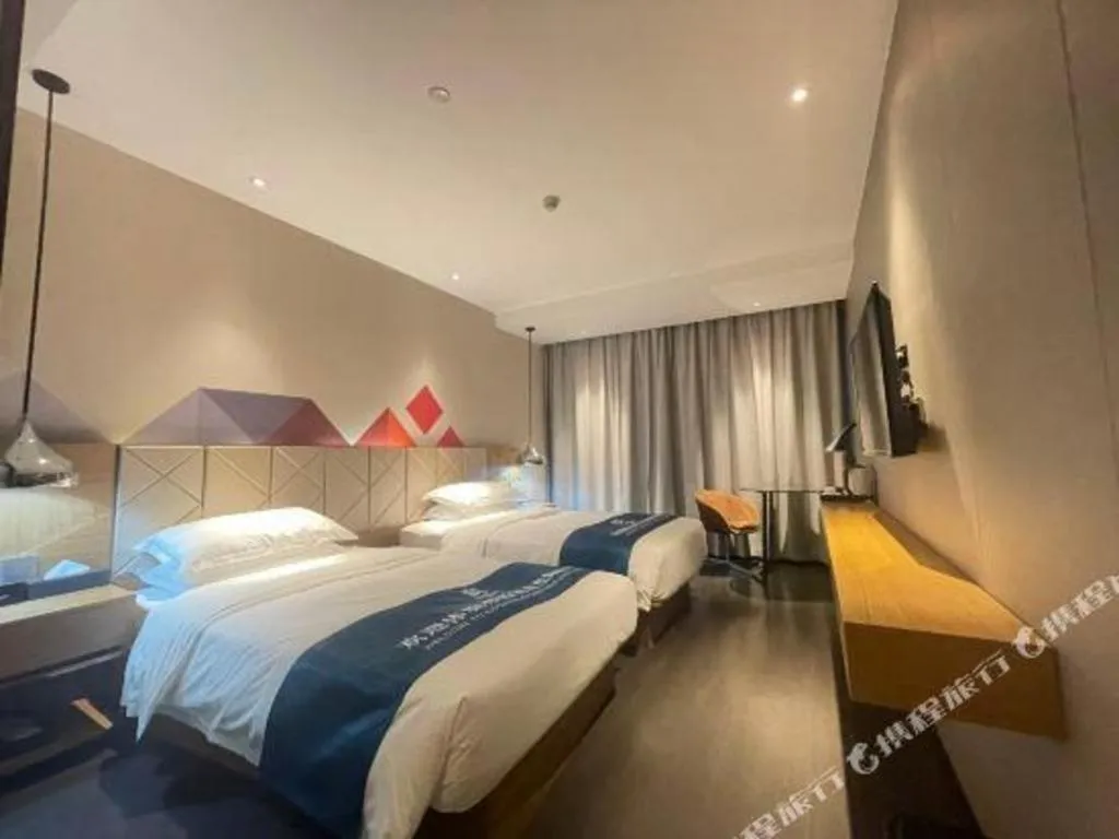 Bed in Borrman Hotel Guangzhou Quzhuang Metro Station