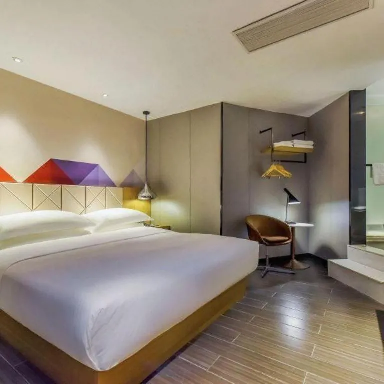 Bed in Borrman Hotel Guangzhou Quzhuang Metro Station