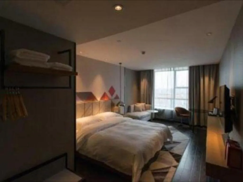 Bed in Borrman Hotel Guangzhou Quzhuang Metro Station