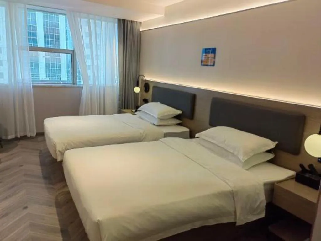 Bed in Borrman Hotel Guangzhou Quzhuang Metro Station