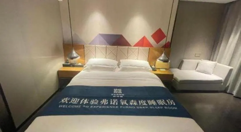 Bed in Borrman Hotel Guangzhou Quzhuang Metro Station