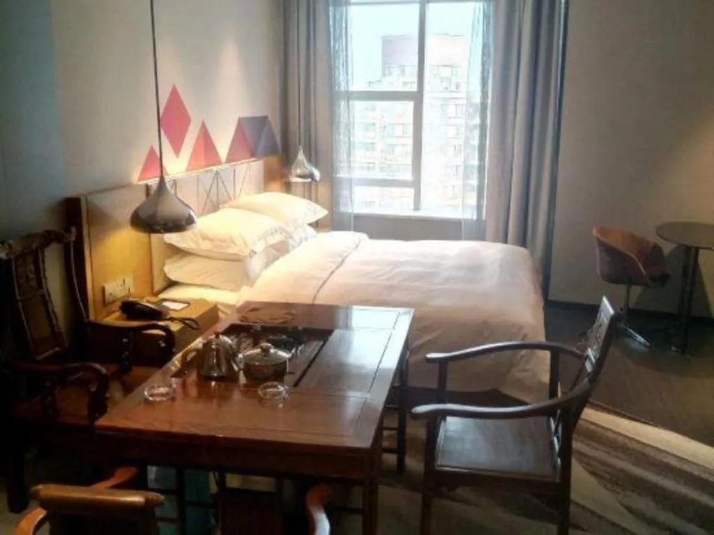 Bed in Borrman Hotel Guangzhou Quzhuang Metro Station