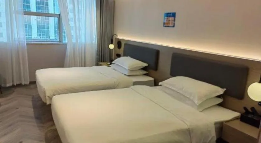 Bed in Borrman Hotel Guangzhou Quzhuang Metro Station