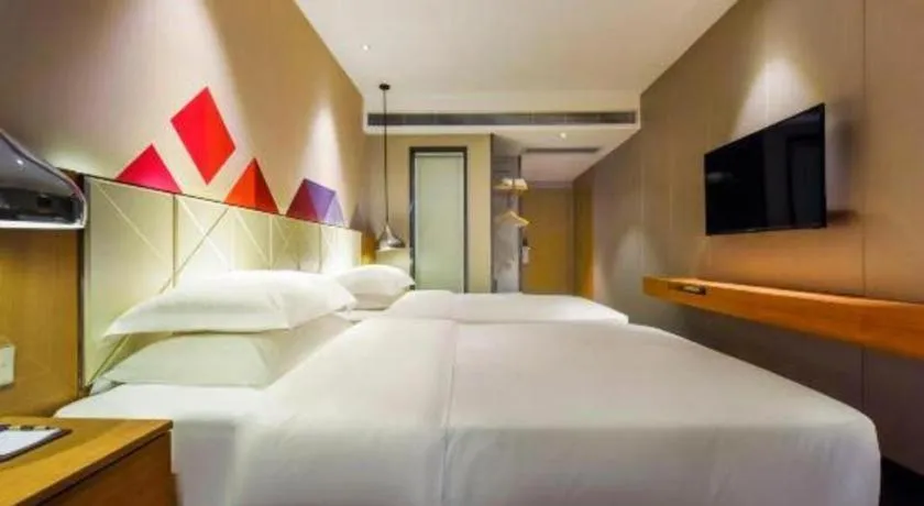Bed in Borrman Hotel Guangzhou Quzhuang Metro Station