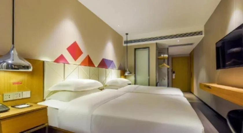 Bed in Borrman Hotel Guangzhou Quzhuang Metro Station
