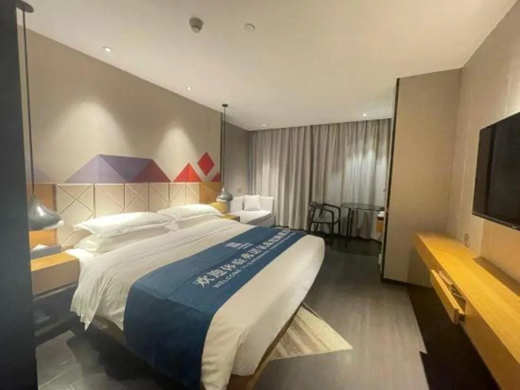 Bed in Borrman Hotel Guangzhou Quzhuang Metro Station