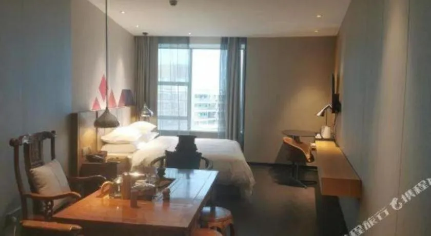 Bed in Borrman Hotel Guangzhou Quzhuang Metro Station