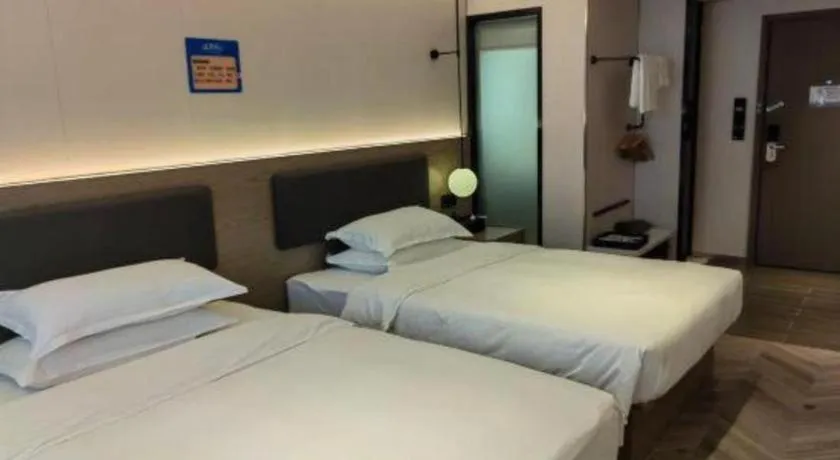 Bed in Borrman Hotel Guangzhou Quzhuang Metro Station