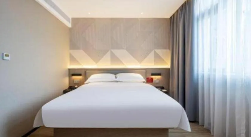 Bed in Borrman Hotel Guangzhou Quzhuang Metro Station