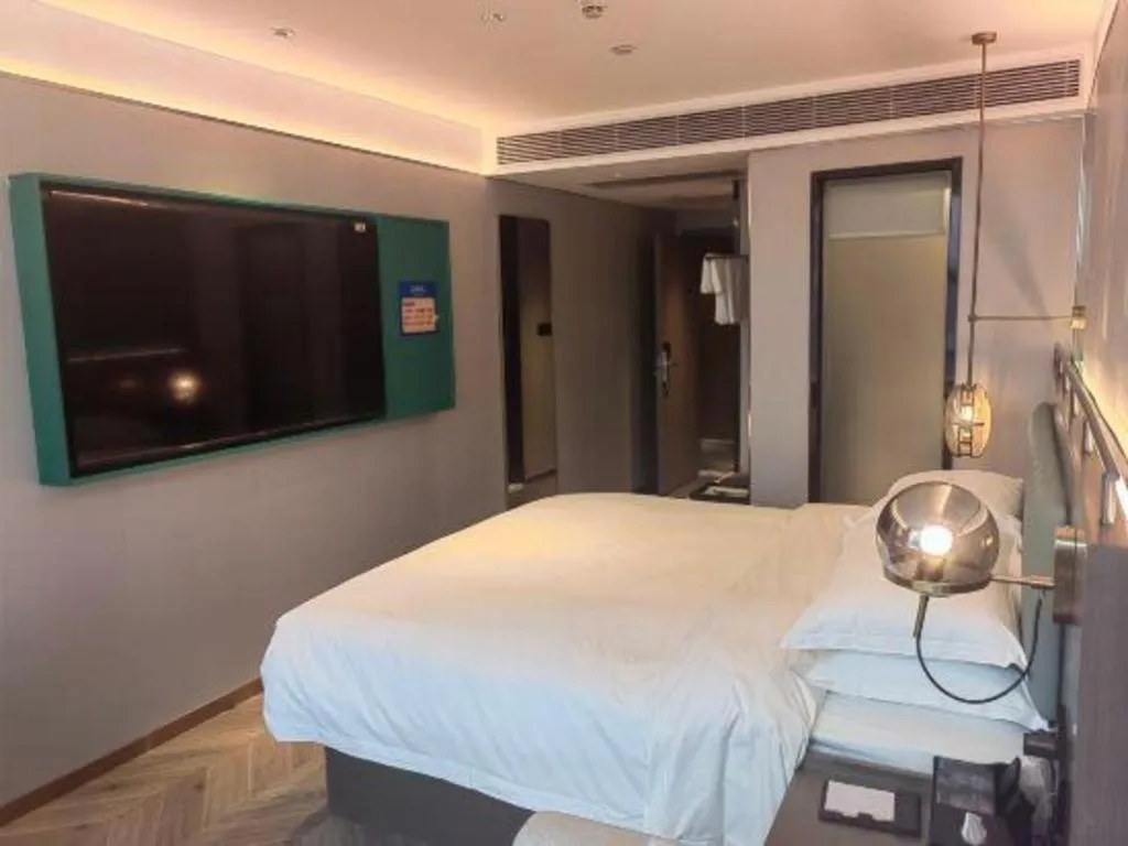 Bed in Borrman Hotel Guangzhou Quzhuang Metro Station