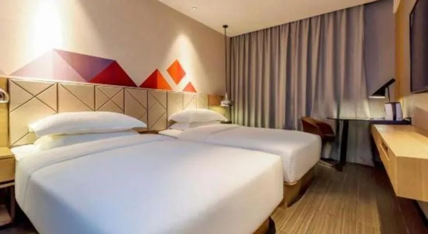 Bed in Borrman Hotel Guangzhou Quzhuang Metro Station