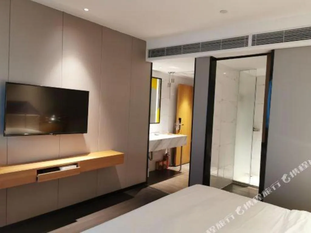 Bed in Borrman Hotel Guangzhou Quzhuang Metro Station