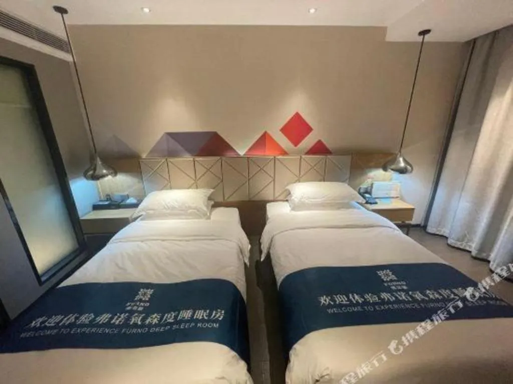 Bed in Borrman Hotel Guangzhou Quzhuang Metro Station