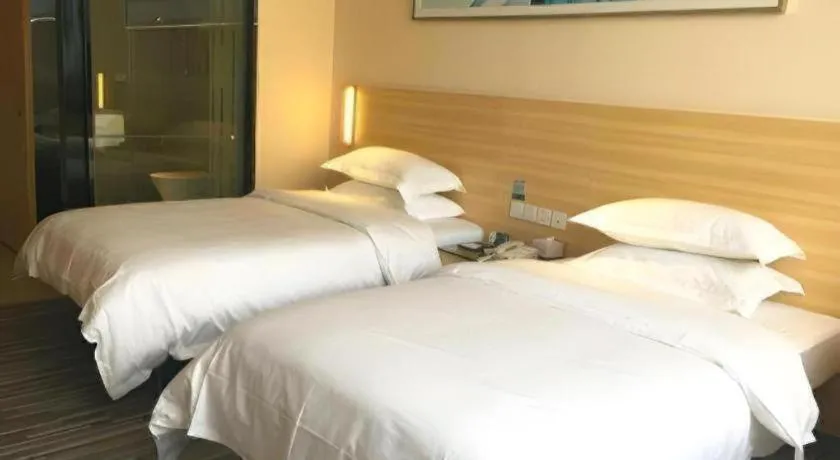 Bed in City Comfort Inn Guangzhou Zhongluotan Culture Square