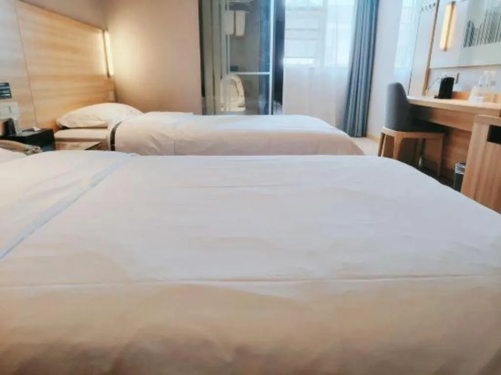 Bed in City Comfort Inn Wuhan Han'Nan Pedestrian Street