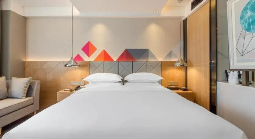 Bed in Borrman Hotel Kunming Dianchi South Asia Fengqingyuan