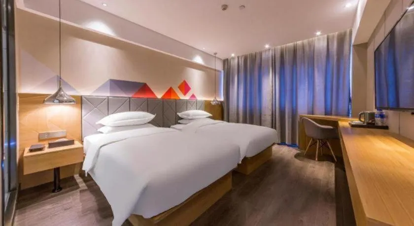 Bed in Borrman Hotel Kunming Dianchi South Asia Fengqingyuan