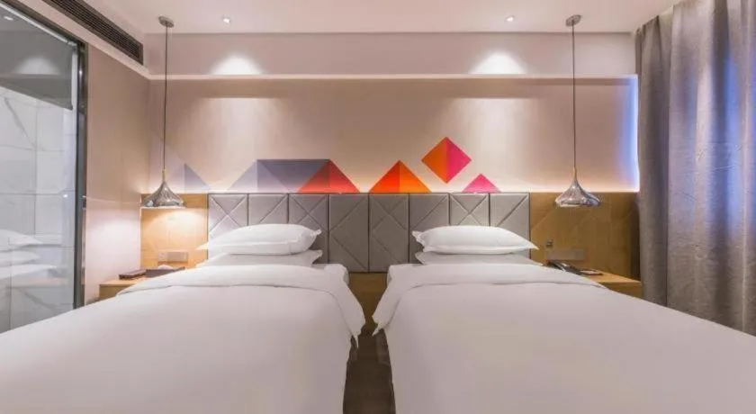 Bed in Borrman Hotel Kunming Dianchi South Asia Fengqingyuan