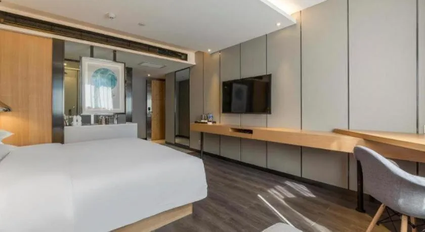 Bed in Borrman Hotel Kunming Dianchi South Asia Fengqingyuan