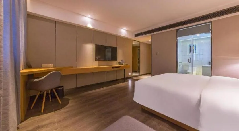 Bed in Borrman Hotel Kunming Dianchi South Asia Fengqingyuan