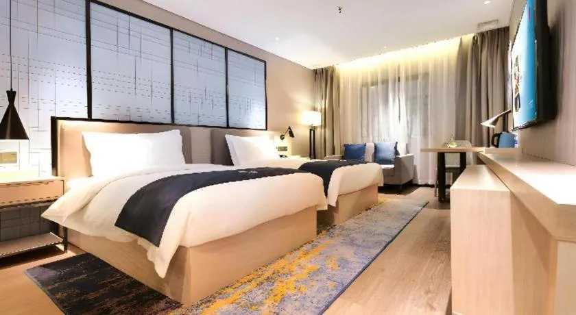 Bed in Echarm Hotel Kunming High-tech Zone Economic Management College