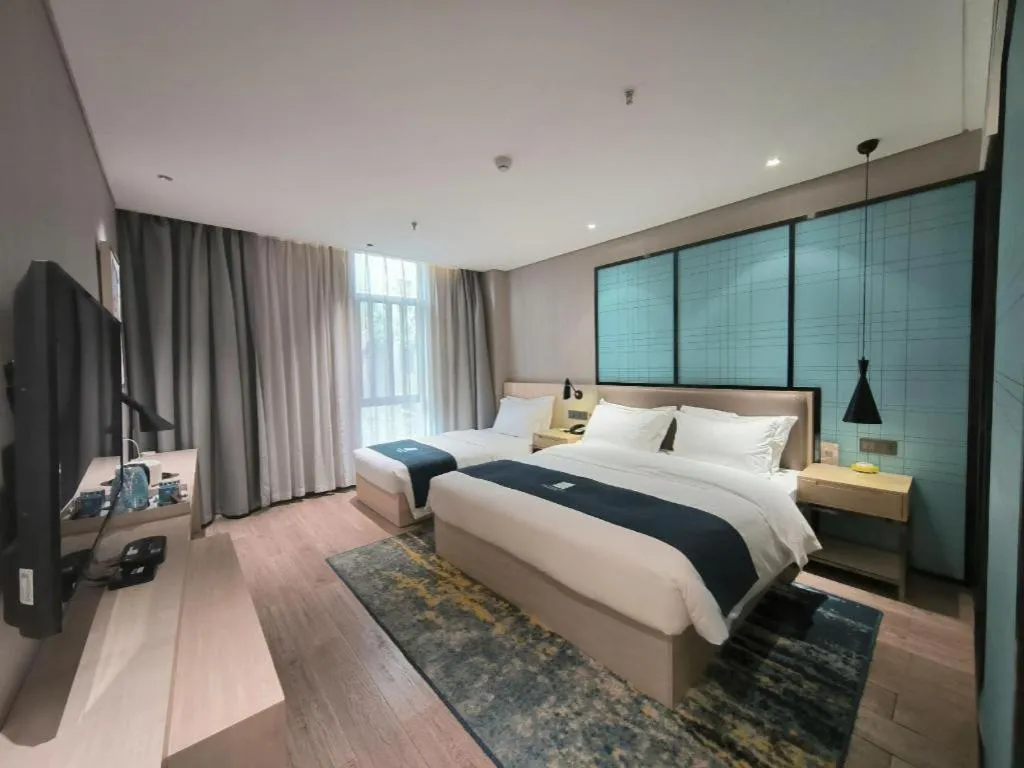 Bed in Echarm Hotel Kunming High-tech Zone Economic Management College