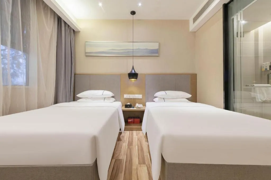 Bed in City Comfort Inn Wuhan Xudong Street Wangjiadun Metro Station