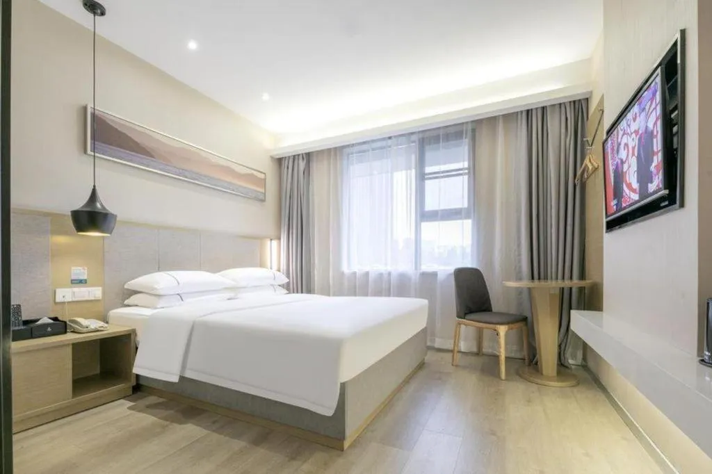 Bed in City Comfort Inn Wuhan Xudong Street Wangjiadun Metro Station