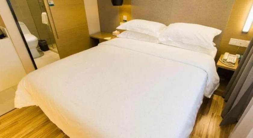 Bed in City Comfort Inn Wuhan Xudong Street Wangjiadun Metro Station