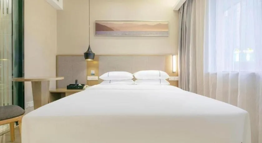 Bed in City Comfort Inn Wuhan Xudong Street Wangjiadun Metro Station