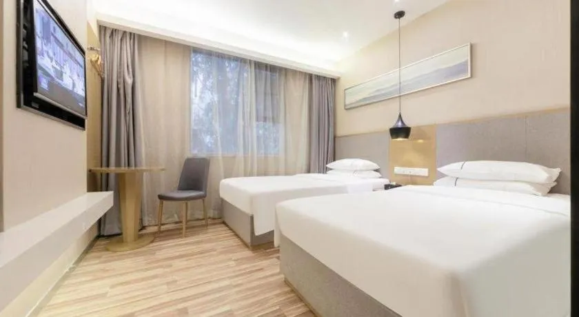 Bed in City Comfort Inn Wuhan Xudong Street Wangjiadun Metro Station