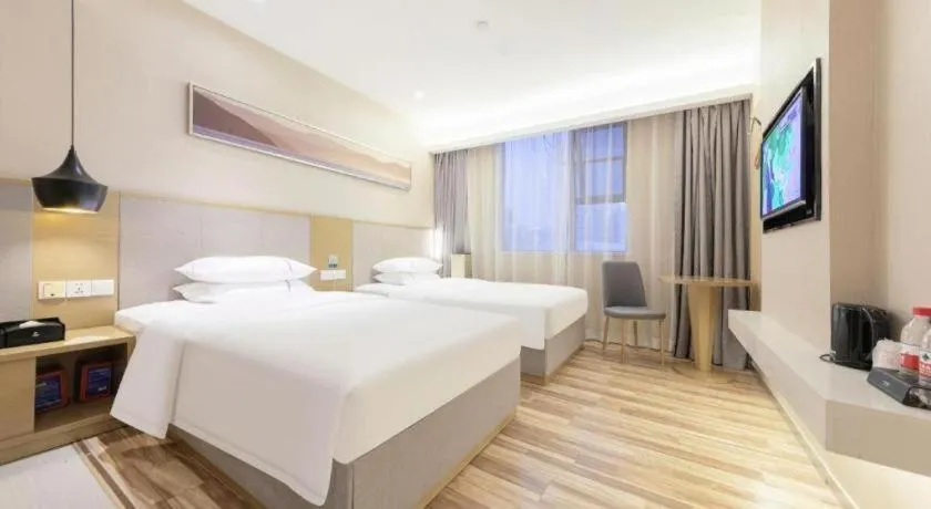 Bed in City Comfort Inn Wuhan Xudong Street Wangjiadun Metro Station