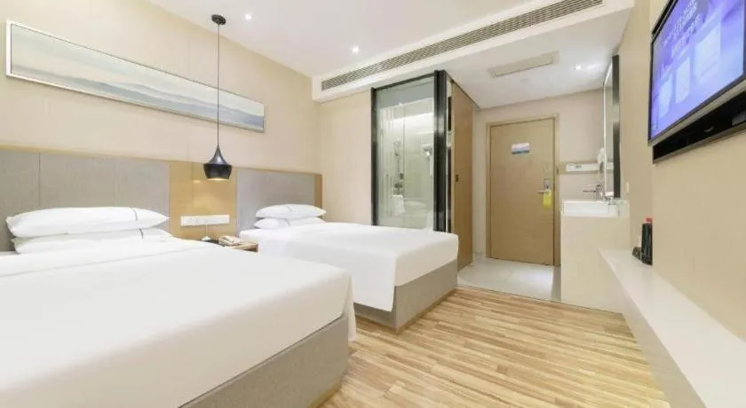Bed in City Comfort Inn Wuhan Xudong Street Wangjiadun Metro Station