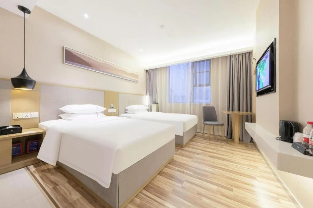 Bed in City Comfort Inn Wuhan Xudong Street Wangjiadun Metro Station