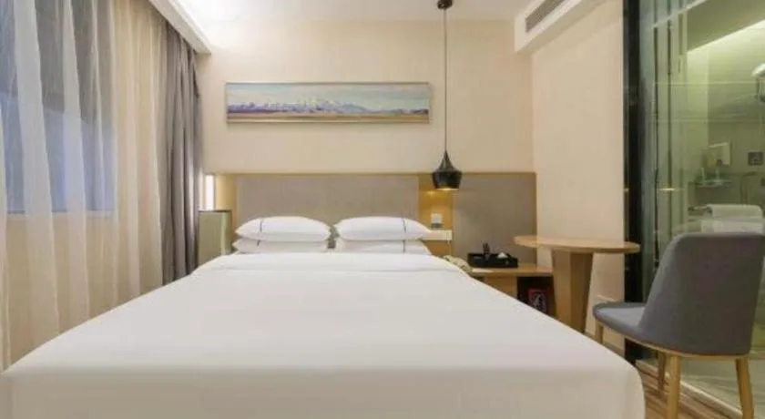 Bed in City Comfort Inn Wuhan Xudong Street Wangjiadun Metro Station
