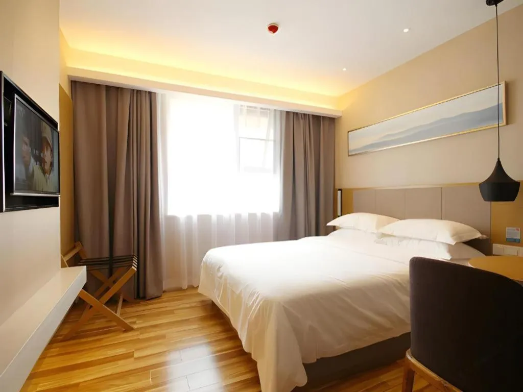 Bed in City Comfort Inn Wuhan Xudong Street Wangjiadun Metro Station