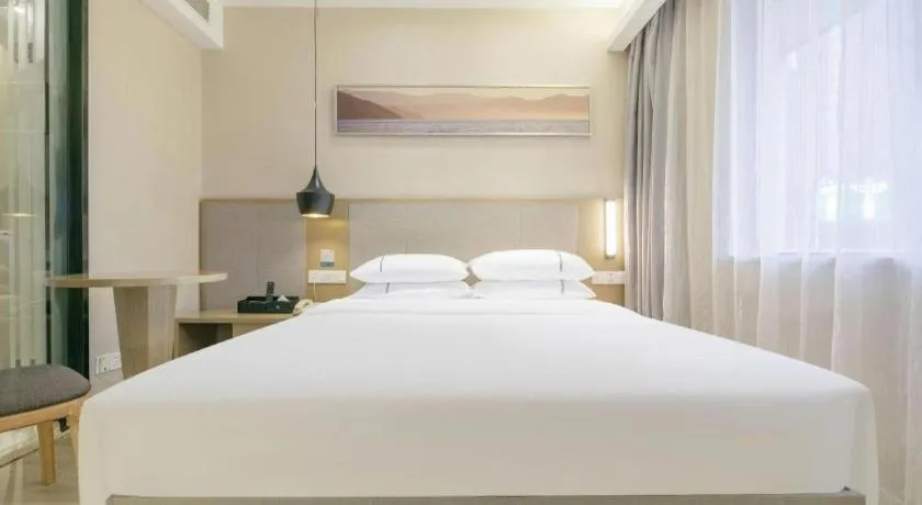 Bed in City Comfort Inn Wuhan Xudong Street Wangjiadun Metro Station