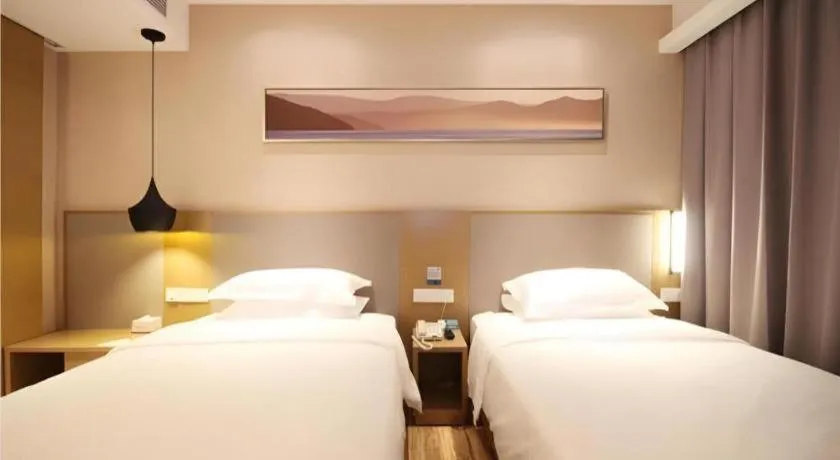 Bed in City Comfort Inn Wuhan Xudong Street Wangjiadun Metro Station