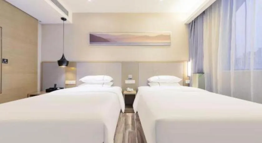 Bed in City Comfort Inn Wuhan Xudong Street Wangjiadun Metro Station