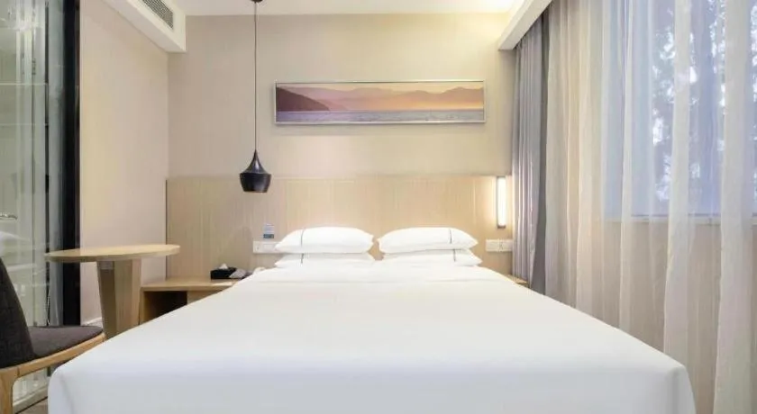 Bed in City Comfort Inn Wuhan Xudong Street Wangjiadun Metro Station