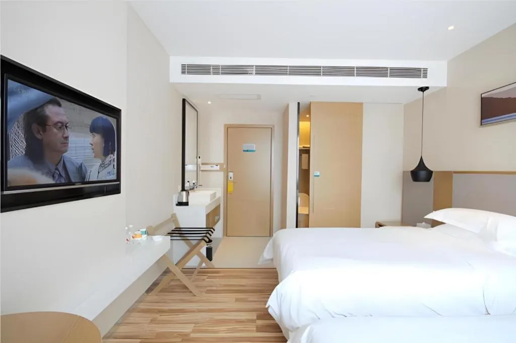 Bed in City Comfort Inn Wuhan Xudong Street Wangjiadun Metro Station