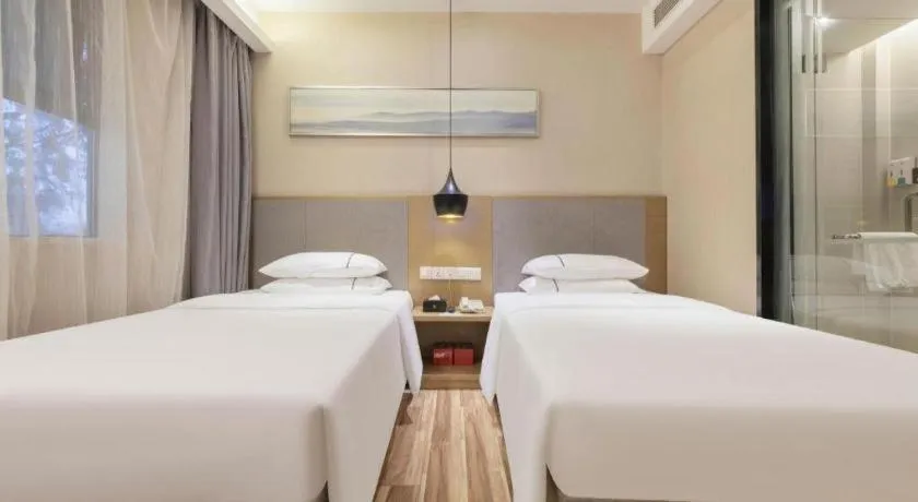 Bed in City Comfort Inn Wuhan Xudong Street Wangjiadun Metro Station