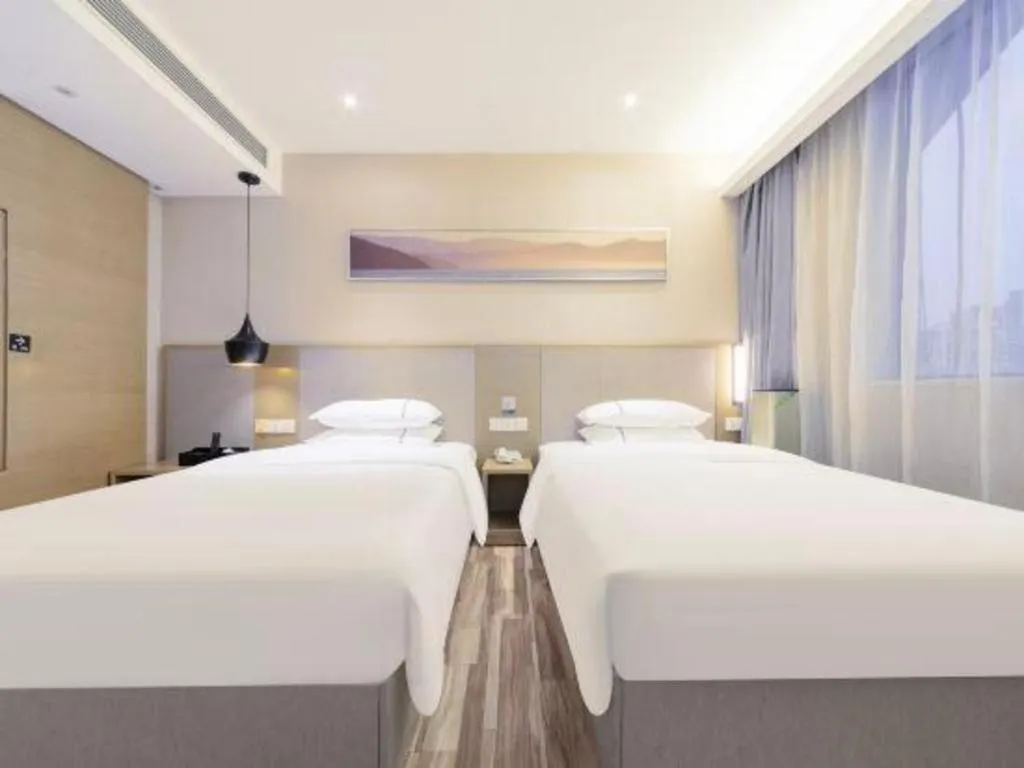 Bed in City Comfort Inn Wuhan Xudong Street Wangjiadun Metro Station